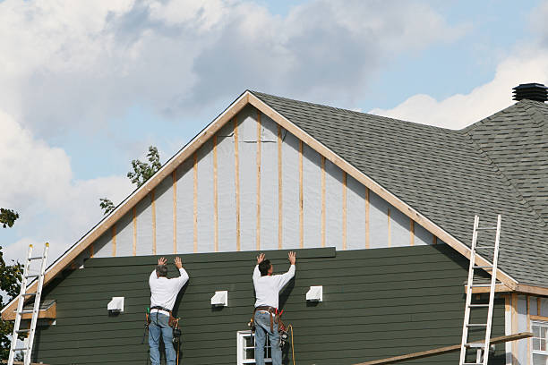 Professional Siding technician working in Finksburg, MD